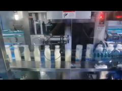 A Closer Look: Filled Milk Bottle Steam Sleeve Shirnking Machine With Brushing Device